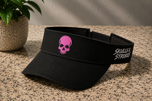 Skulls & Strokes black branded golf visor with pink skull and white side embroidery