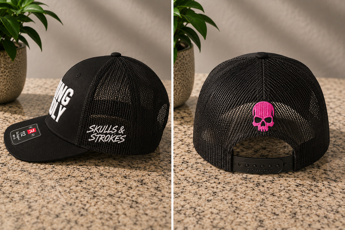 Swing Deadly Richardson 112 trucker hat showing Skulls & Strokes side embroidery and pink skull back embroidery