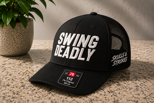 Swing Deadly Richardson 112 black trucker hat with white puff embroidery and Skulls & Strokes side logo