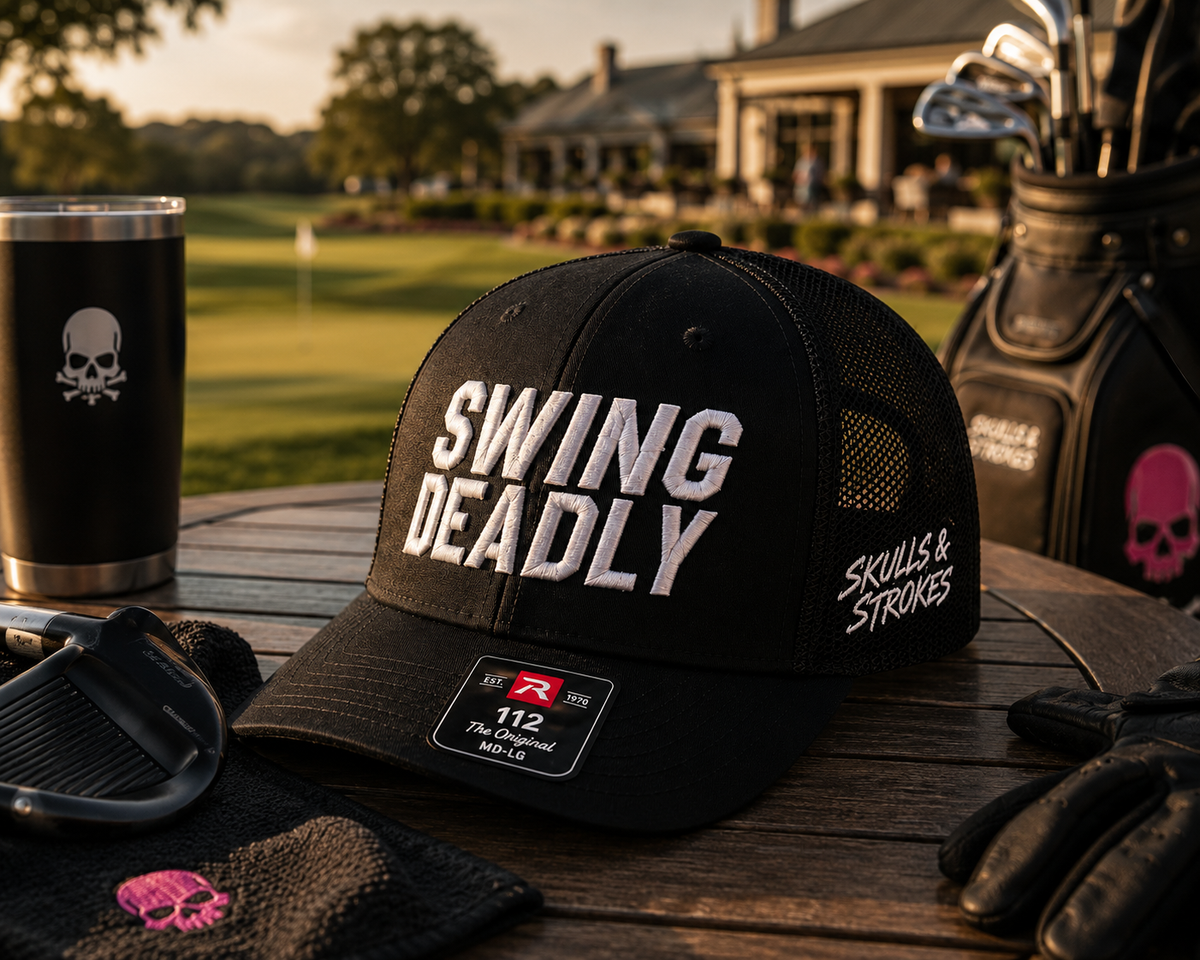 Swing Deadly Richardson 112 trucker hat with Skulls & Strokes embroidery displayed with golf gear